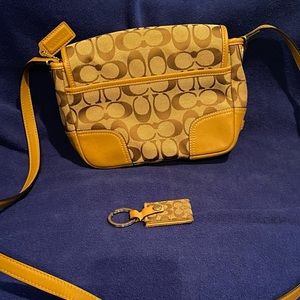 Coach- Women’s small crossbody with key holder